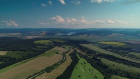 Aerial view over agricultural fields, forest and dam. Dalgopol, Varna, Bulgaria