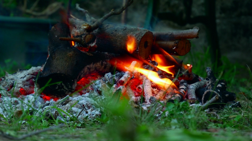 Wood charcoalfire outside, camp fire Burning under goulash pan 4k closeup Video
