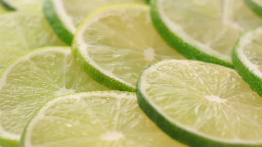 Lime slices background | Shutterstock HD Video #1032460