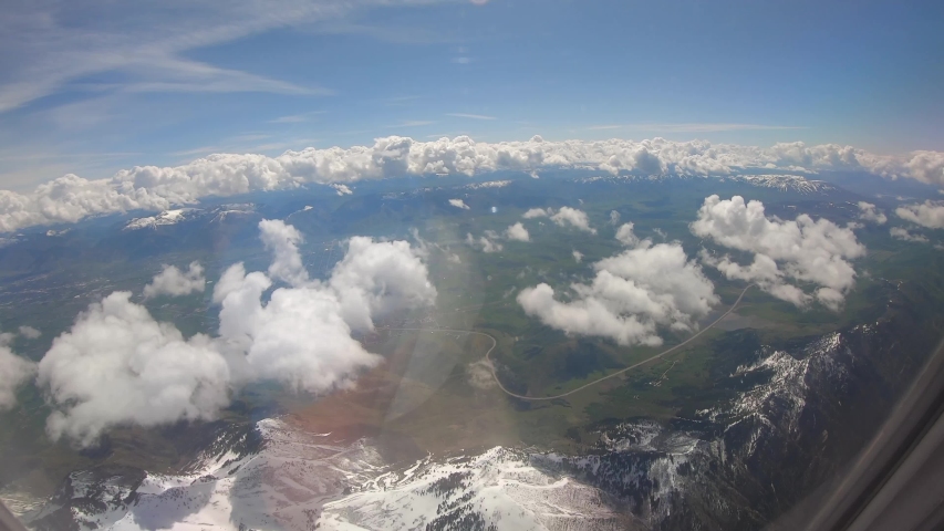 Flight Over Wasatch Range Utah Michigan Chicago Wyoming Idaho City Canyon Mountain Wasatch Range Spring Vacation Airplane Travel Trip Colors Blue Sky Epic Clouds Cinematic Video USA 4K