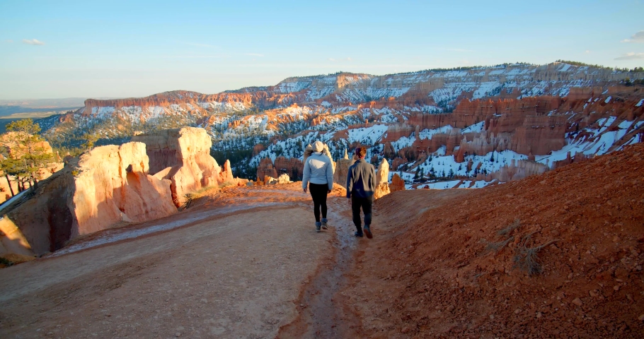 Couple Hiking the Top of Arches National Park, Utah