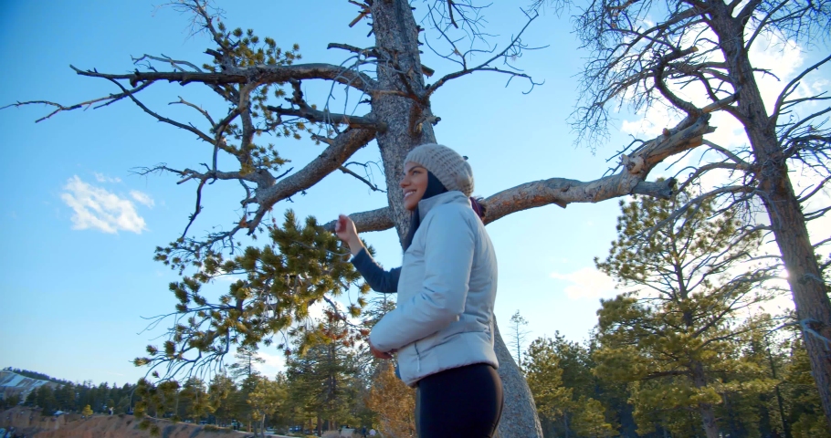 Couple Hiking Beautiful Canyon Landscape, Arches National Park