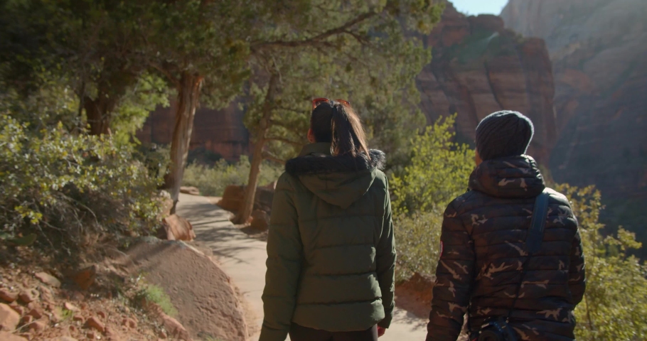 Hikers in Zion National Park, Couple Walk Together in Slow Motion