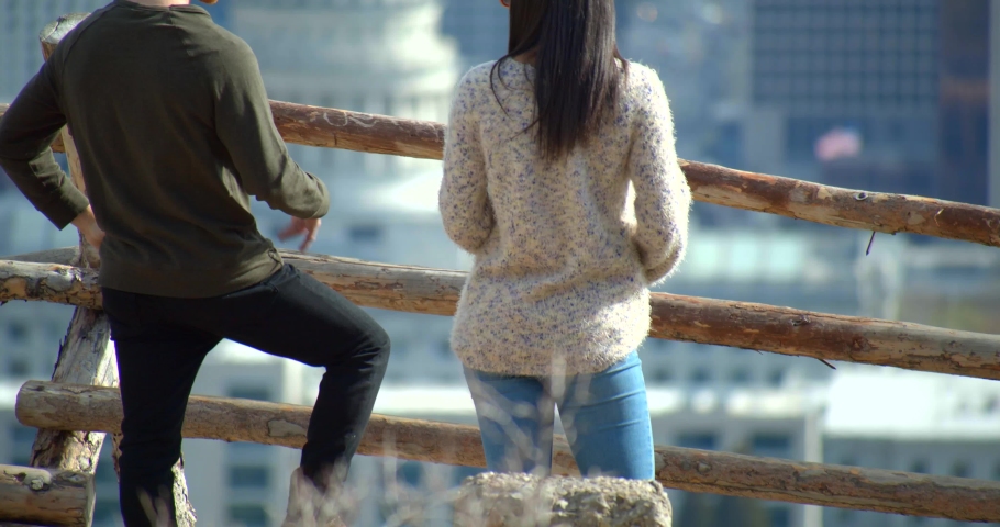 Couple Hanging Out Above Salt Lake City, Utah Mountain Overlook