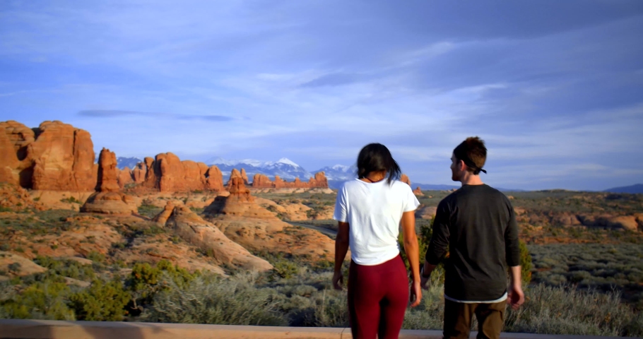 Couple Walking Through Arches National Park, Utah
