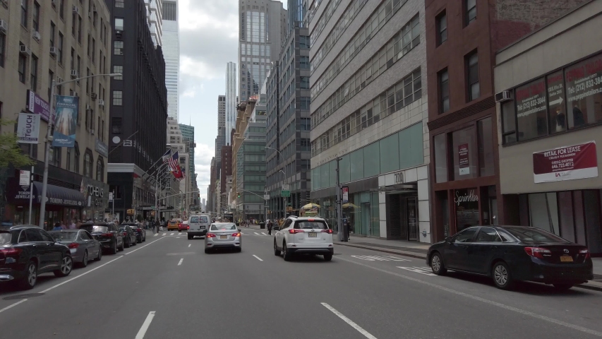 MANHATTAN, NY, USA - JUNE 22, 2019: Driving Downtown Manhattan New York 4k 60p