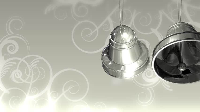 High definition animation of silver bells swinging over a gray, satin decorative