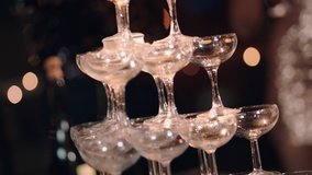 happy celebration woman pouring champagne tower at glamorous dance party celebrating with friends enjoying crazy nightlife wearing stylish fashion dancing on rooftop at night 4k footage - Powered by Shutterstock - Get 15% off with code: PIKWIZARD15