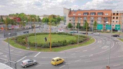 Gyor Hungary 05 07 2019 Vehicles are passing through a lantern on a multi-lane roundabout