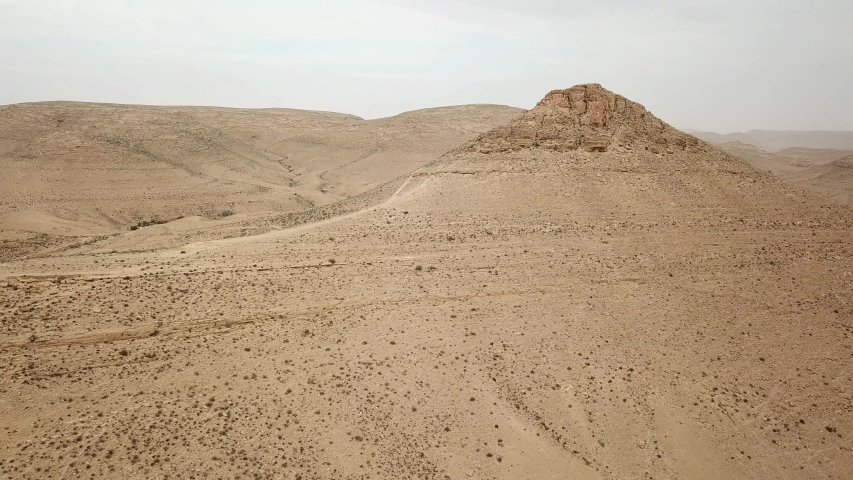 Aerial view over Wadi Nizzana Negev desert
 | Shutterstock HD Video #1032526166