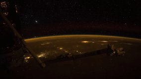 Planet Earth seen from the International Space Station with lightning storm over the earth with aurora borealis, Time Lapse. Images courtesy of NASA.