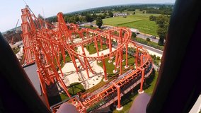 A first-person view, on an extreme hill, a view of an amusement park. Incredible height. Fear. Dangerous slide. Active extreme rest. - Powered by Shutterstock - Get 15% off with code: PIKWIZARD15