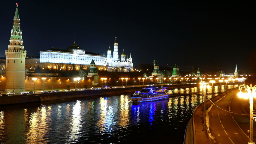 Moscow. Kremlin. Nightlife metropolis does not freeze at night. Tourists walk, cars rush, the city is full of bright lights.