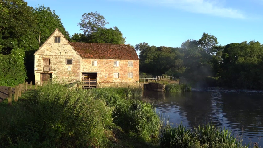 Sturminster Newton Mill, Dorset, England, Early morning, pan of Mill and river Stour.
