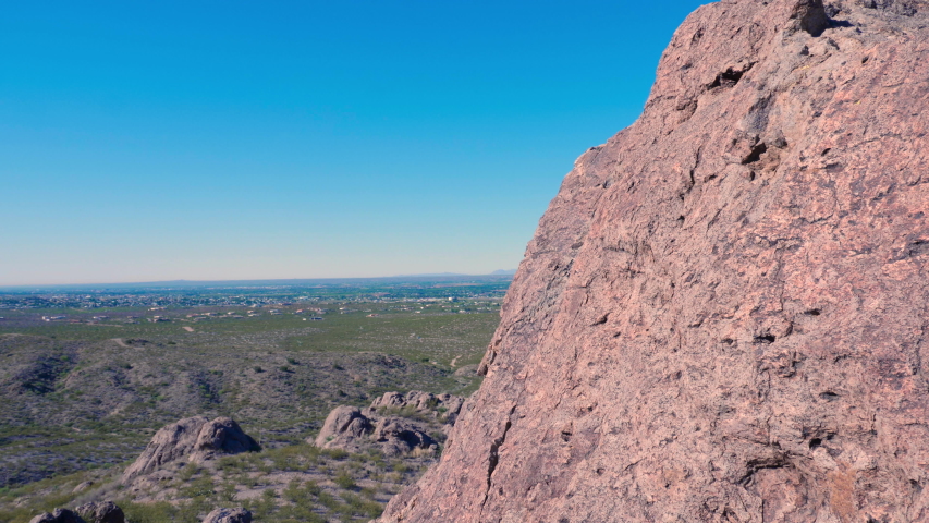 Rock Formation Move Left Reveal Mountain View. view moves left from a rock formation to reveal the organ mountains in New Mexico