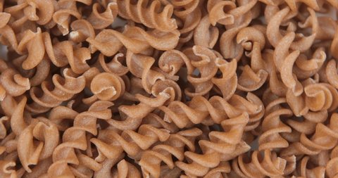 Brown buckwheat pasta. Food background