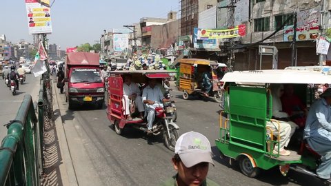LAHORE, PAKISTAN - Circa April, 2019: Rush hour traffic in walled city of Lahore, Pakistan