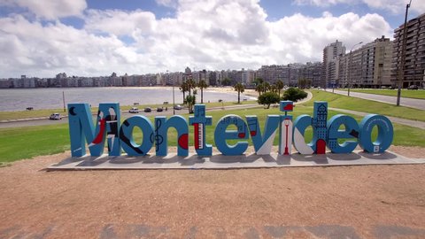 Montevideo, Uruguay - January 15, 2018: Flying over the famous Montevideo sign at Los Pocitos Beach on a sunny day in Montevideo, Uruguay.