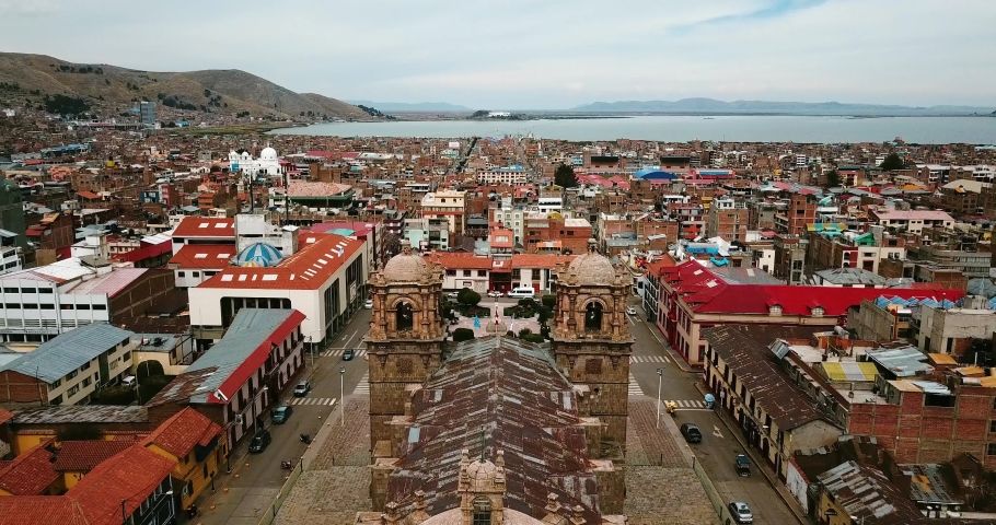 Plaza de Armas in Puno with Titicaca lake in the background