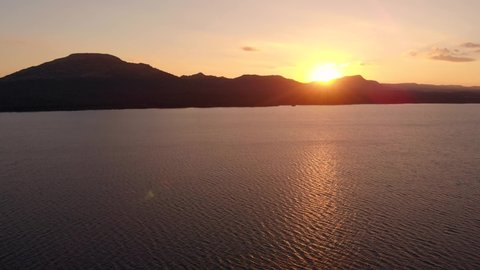 Aerial View of Sunset at Mountain and Lake