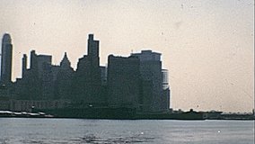 New York vintage footage on 1970 about construction site of Twin Towers under construction on seventy. New York skyline from New Jersey side with World Trade Center and Lower Manhattan.