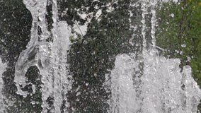 City Park Fountains, Closeup Water Jet and Splashes in Slow Motion Video. Closeup Water Drops City View HD Footage