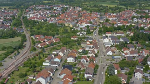 Aerial of the village Ubstadt in Germany. Wide view with pan to the right.