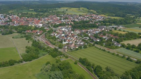 Aerial of the village Ubstadt in Germany. Very wide view with pan to the right.