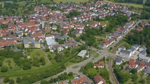 Aerial of the village Ubstadt in Germany. Wide view with round pan to the left.