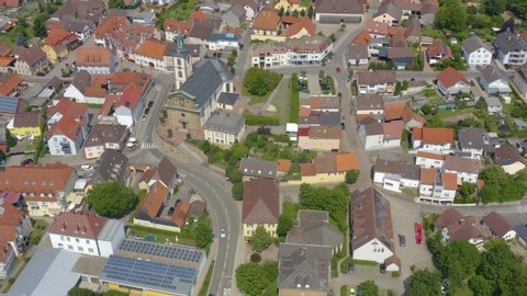 Aerial of the village Ubstadt in Germany. Round pan to the right around downtown.