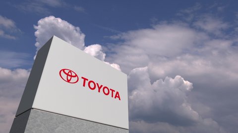 TOYOTA logo against sky background, editorial 3D animation