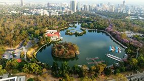Aerial footage of chapultepec park and lake, Mexico city.