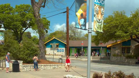 SAN ANTONIO, TX - 2019: Zoo Exterior Lamp Post Signage at the Entrance to the Popular Attraction on a Sunny Day in Texas