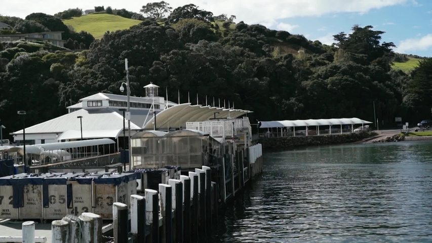 POV shot of Ferry arriving at Matiatia Bay wharf in Waiheke Island, New Zealand