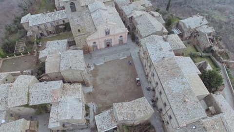 Aerial 360 shot of the center city of Civita di Bagnoregio in Viterbo. Drone shot at noon. 4K