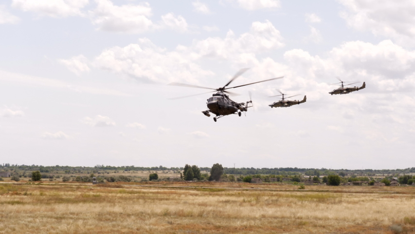 Large cargo army helicopter troops of military soldiers to place of war