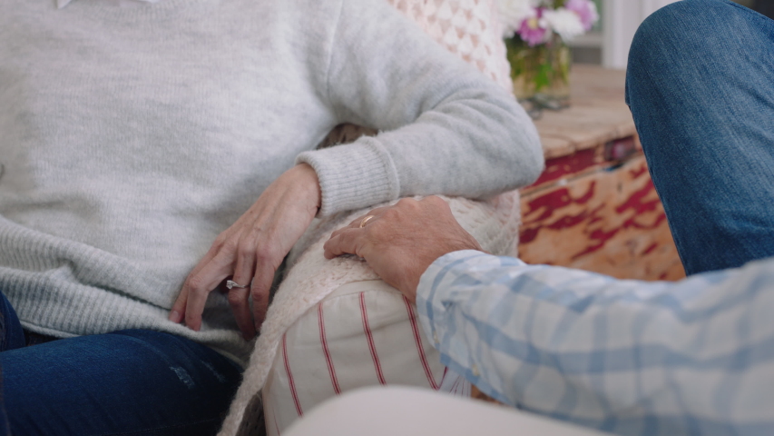 Close up old couple holding hands gently touching sharing romantic connection expressing love after long marriage kindness forgiveness concept 4k footage | Shutterstock HD Video #1032766841