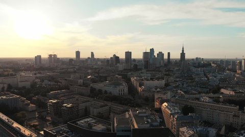 Establishing aerial shot of Warsaw city center in the evening. View from above. Poland.