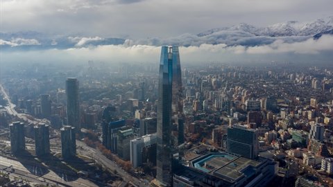 Santiago, Chile; June 15, 2019: Aerial hyperlapse of Santiago of Chile with the snowy Andes mountains in the background