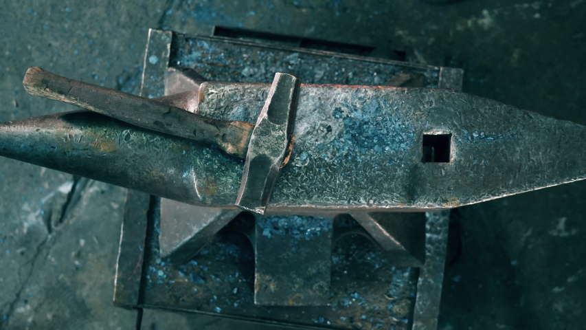 Top view of the anvil and the tool getting hammered Royalty-Free Stock Footage #1032790004