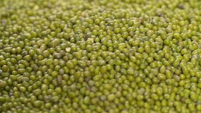 Green Raw Lentils rotating Slow Motion background video