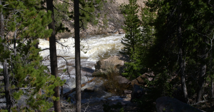 Wide Shot of the Provo River with white water rushing near Kamas, Utah.