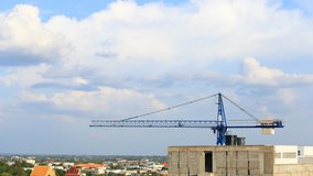 4k Time-lapse of construction cranes with cloud and sky - Powered by Shutterstock - Get 15% off with code: PIKWIZARD15