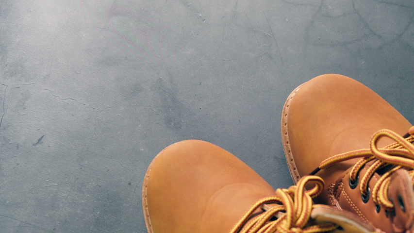 Close up shoes leather brown for hiking adventure wilderness.