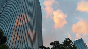 view of the beautiful modern facade and sunset sky - Powered by Shutterstock - Get 15% off with code: PIKWIZARD15