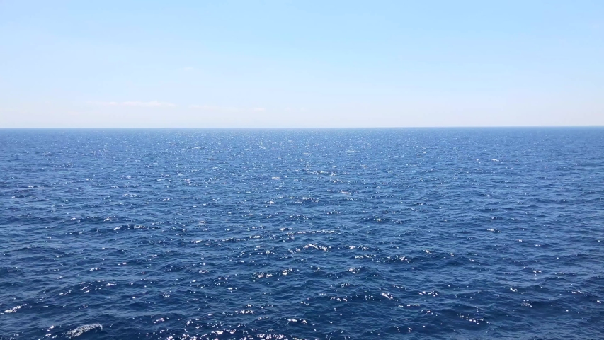 Smooth cruise on the glittering sea | Shutterstock HD Video #1032856784