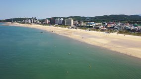 Aerial video from drone at Boryeong city  Daecheon beach, South Korea on 6 July 2019.There are tourists around the world coming here.
