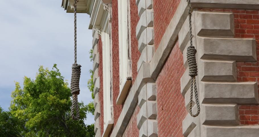 TOMBSTONE, ARIZONA - 12 JUN 2019: Tombstone Arizona historic town gallows courthouse. Court house and jail capital death penalty for outlaws and law breakers.