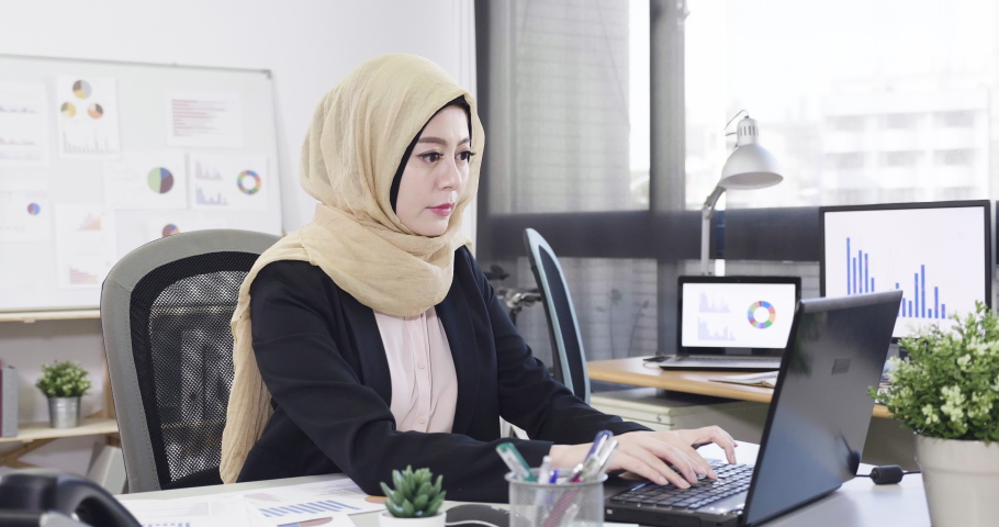 Serious Malay Businesswoman In Yellow Stock Footage Video 100 Royalty Free 1032870311 Shutterstock