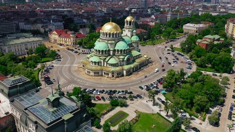Aerial drone panorama of Cathedral and the old town with amazing red roofs on a sunny day. St. Alexander Nevsky Cathedral Sofia Bulgaria.